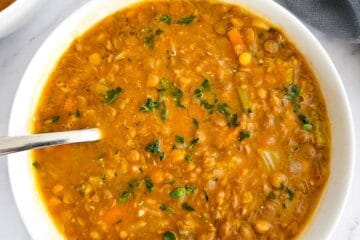 Greek lentil soup-fakes-in a white bowl