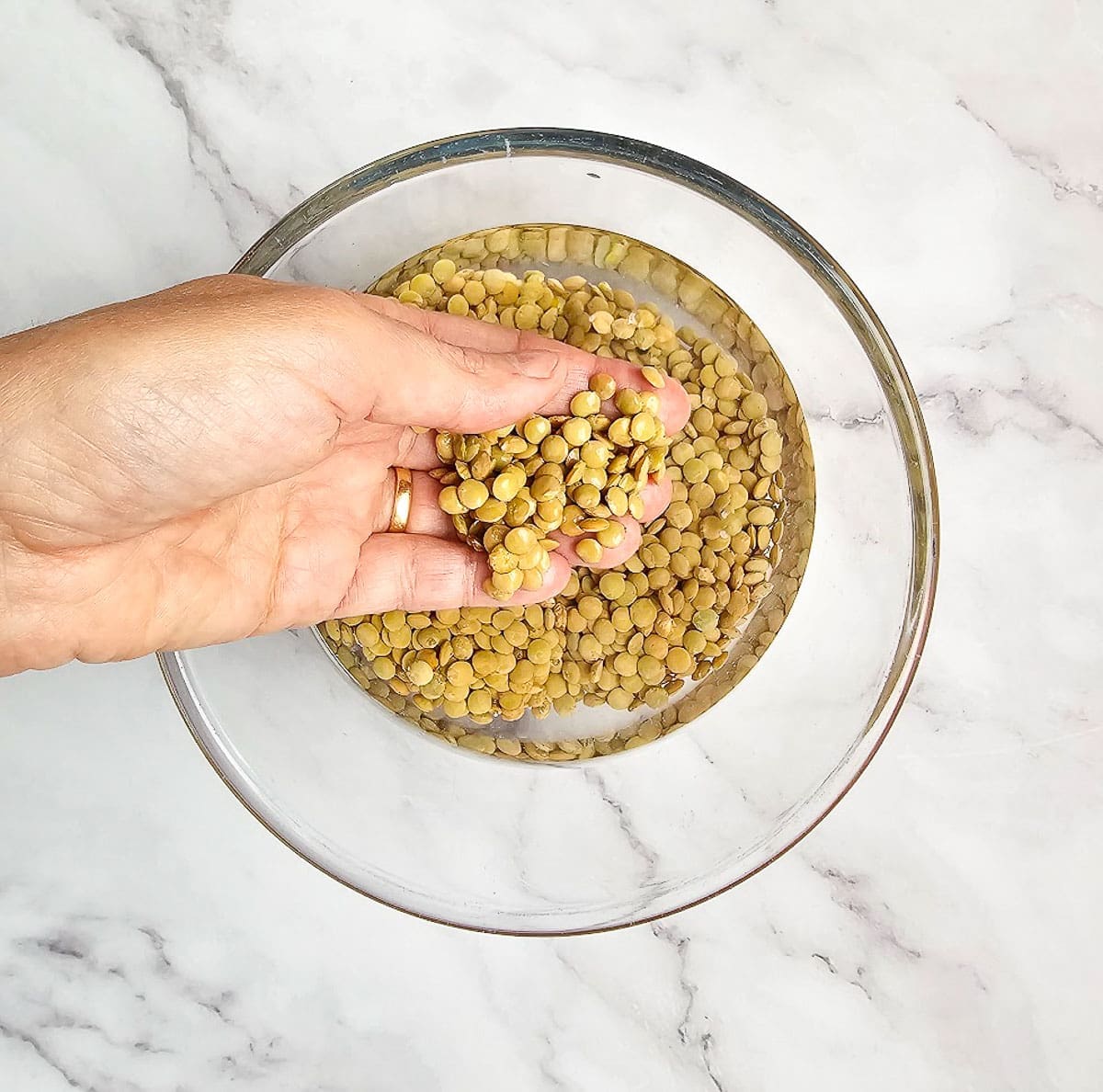 Greek lentil soup-fakes-soaking in bowl