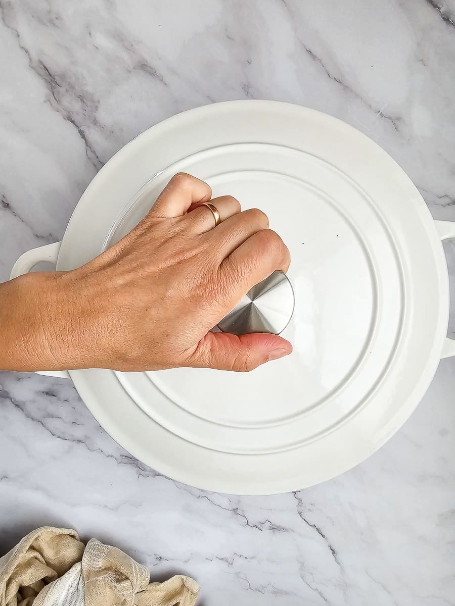 simmering with lid on dutch oven pot