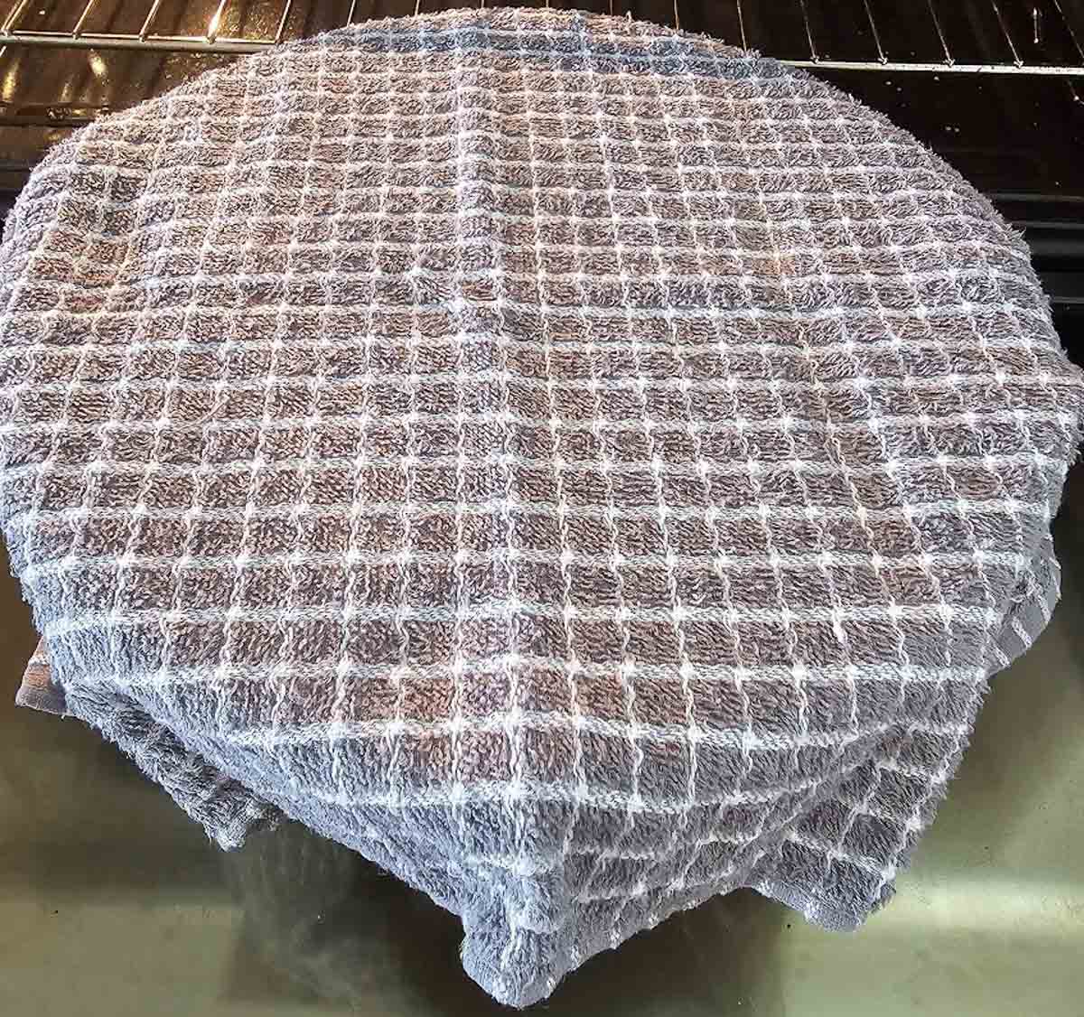 tsoureki- proof dough in warm area-cover with tea-towel.