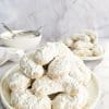 Greek Almond Shortbread Cookies-Kourambiedes-on white plate