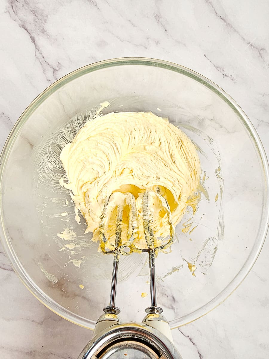 creaming butter and sugar in bowl