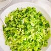 Greek lettuce salad maroulosalata in a white bowl