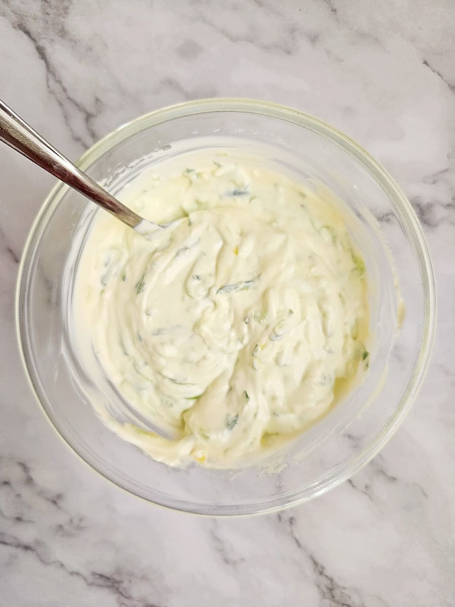 Tzatziki- combining ingredients in a bowl