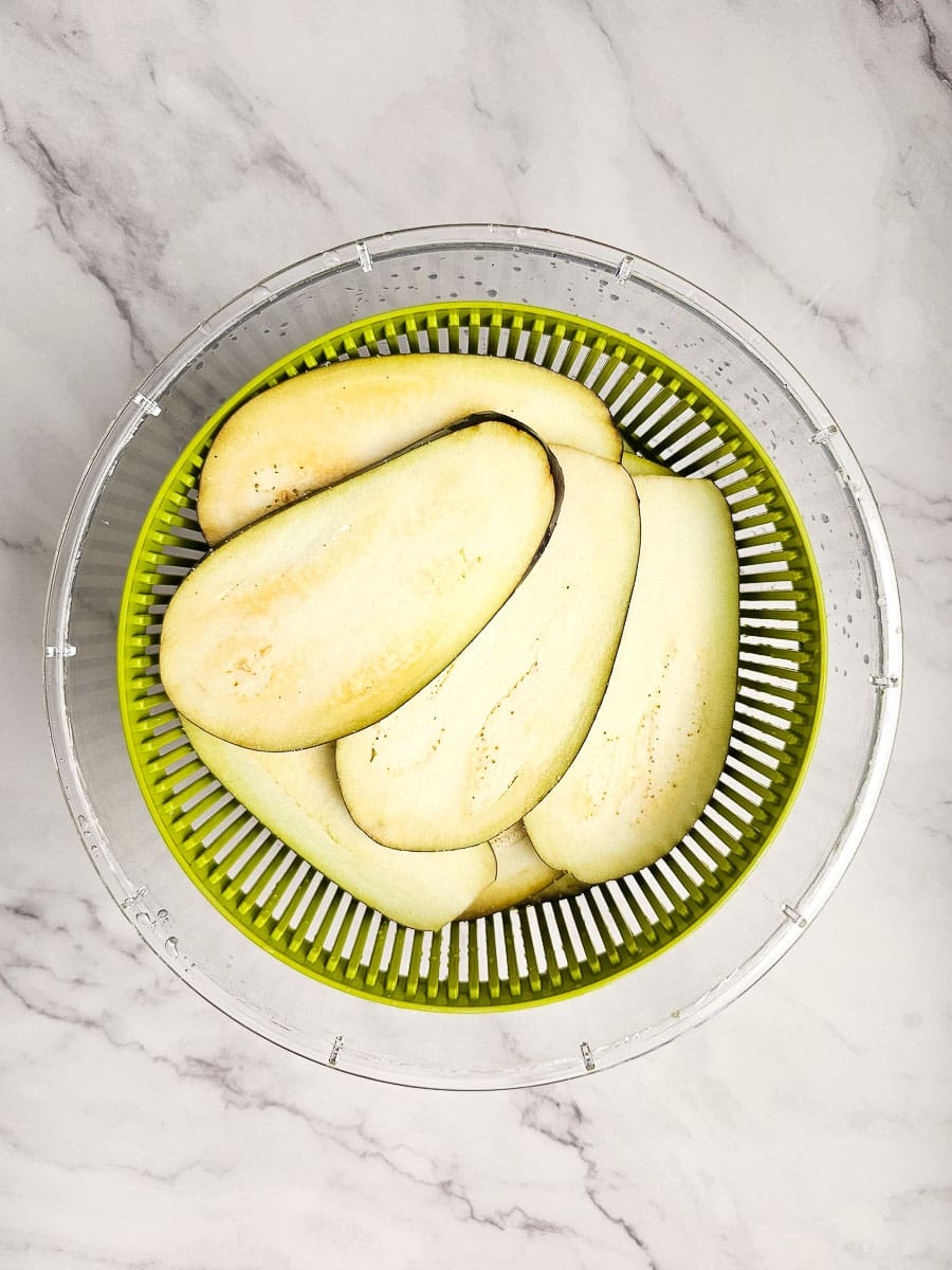 eggplants in a colander