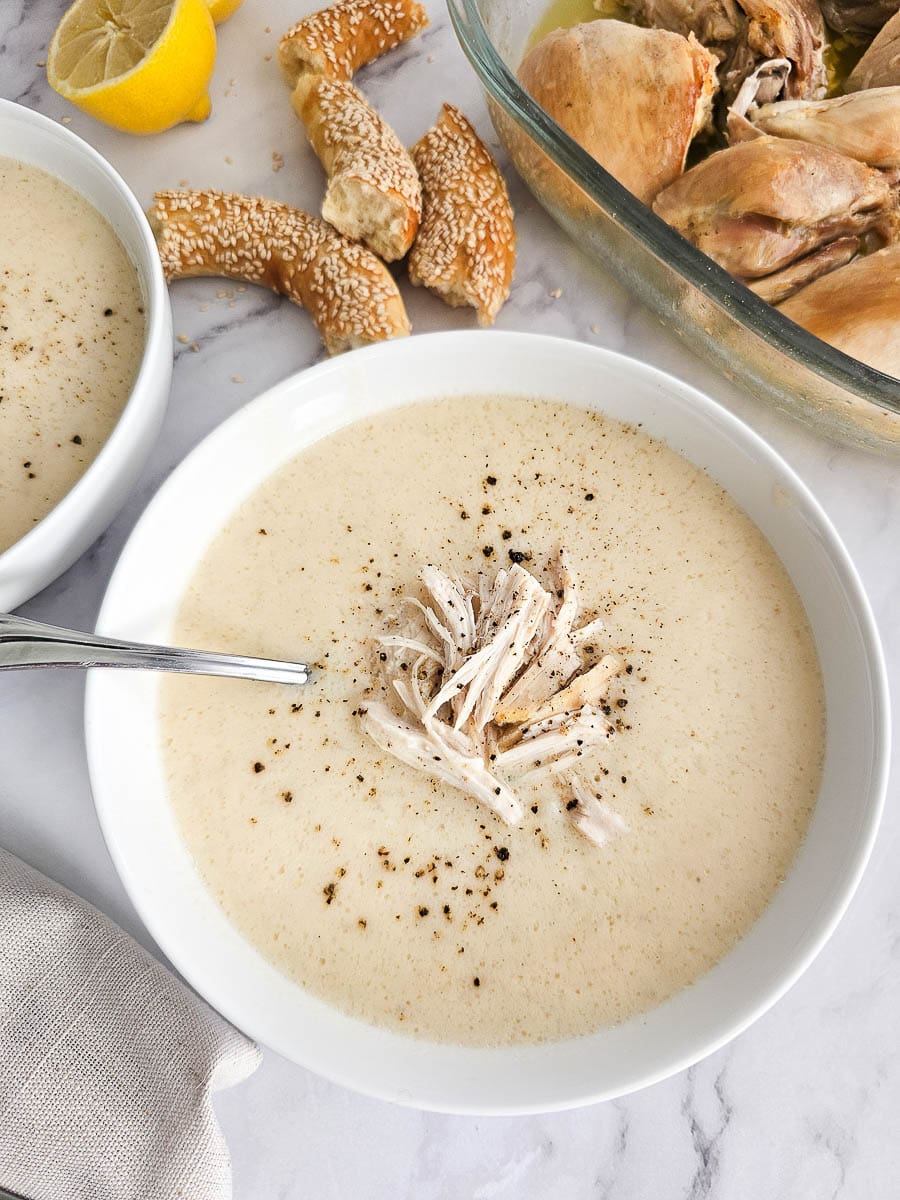 Greek lemon chicken soup avgolemono in bowls with chicken