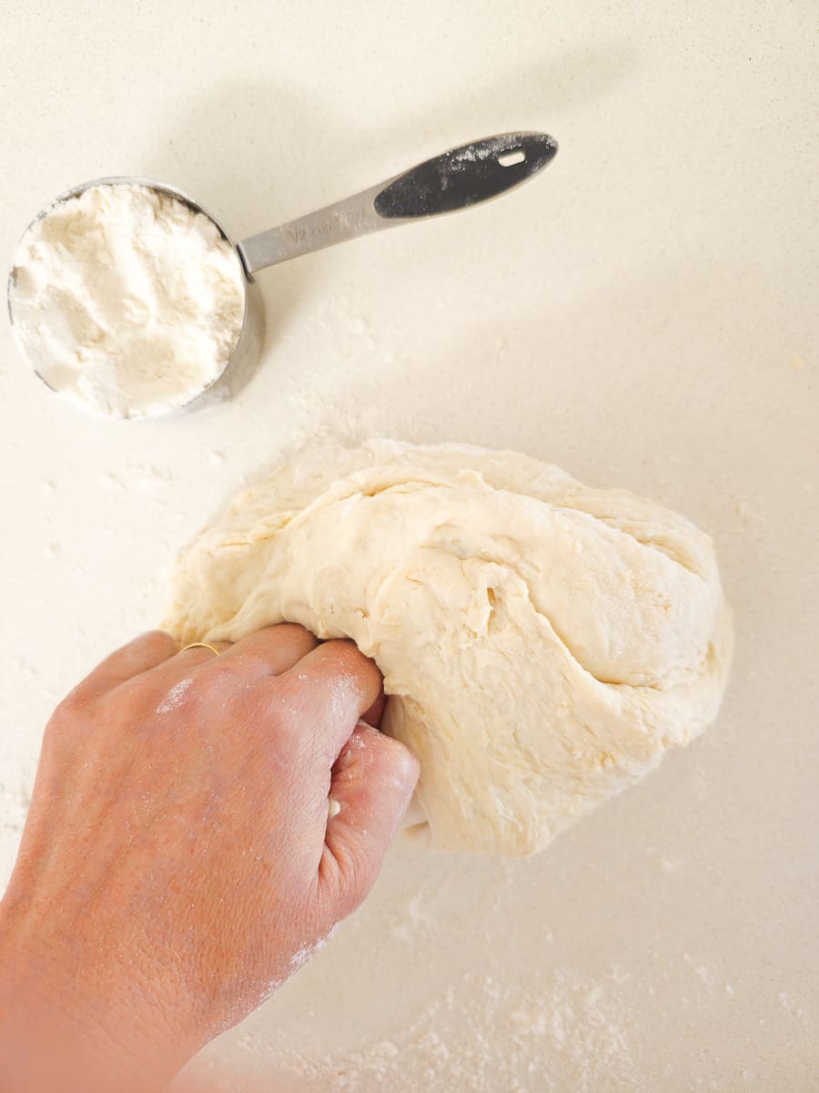 kneading dough for koulouri bread