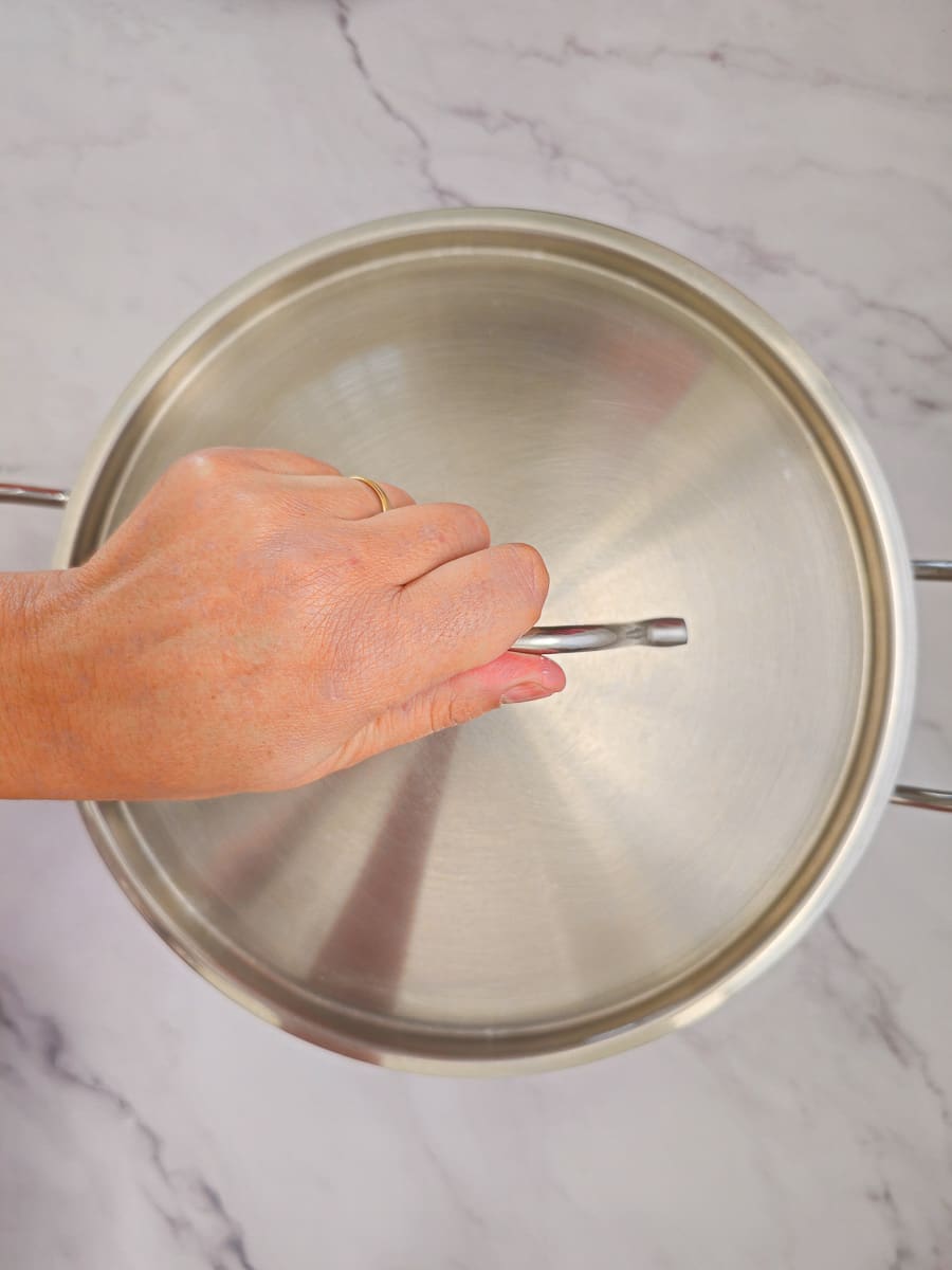 boiling with lid on saucepan