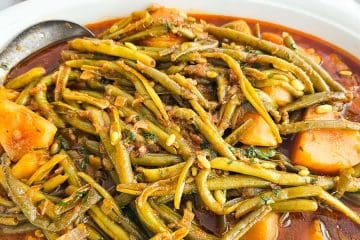 Fasolakia -Green Beans with potatoes on a plate