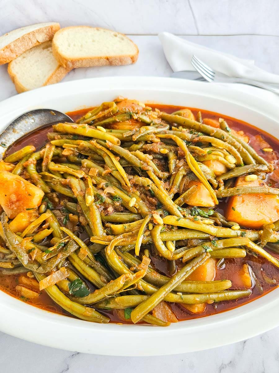 Fasolakia -Green Beans with potatoes on a plate