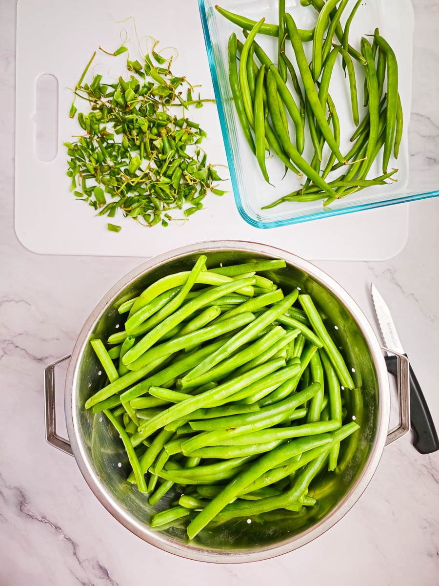 green beans in colander trimming edges