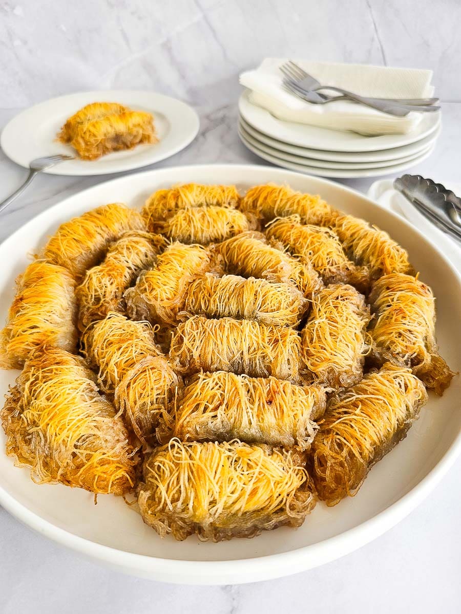 Kataifi - Greek String Pastry Nut Rolls on a plate