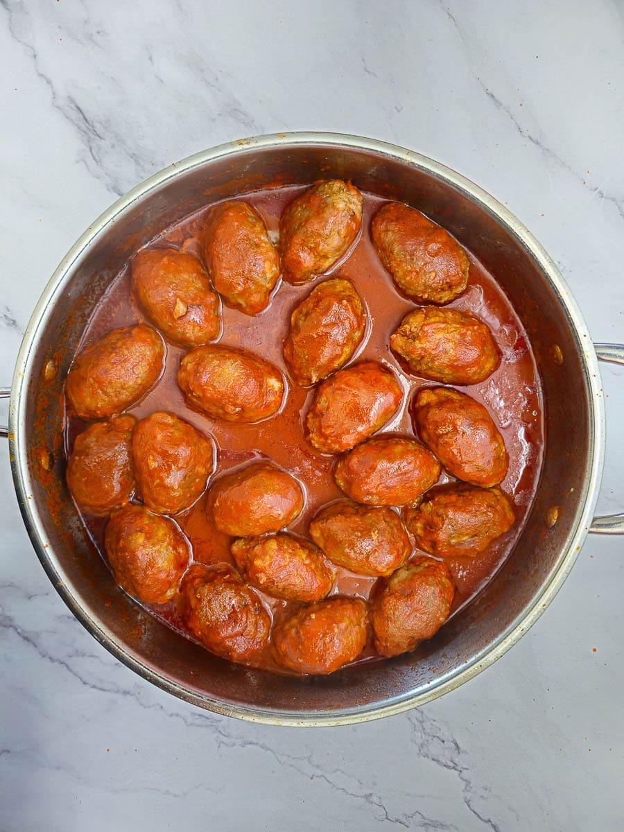 Soutzoukakia - Greek meatballs in tomato sauce in a pan