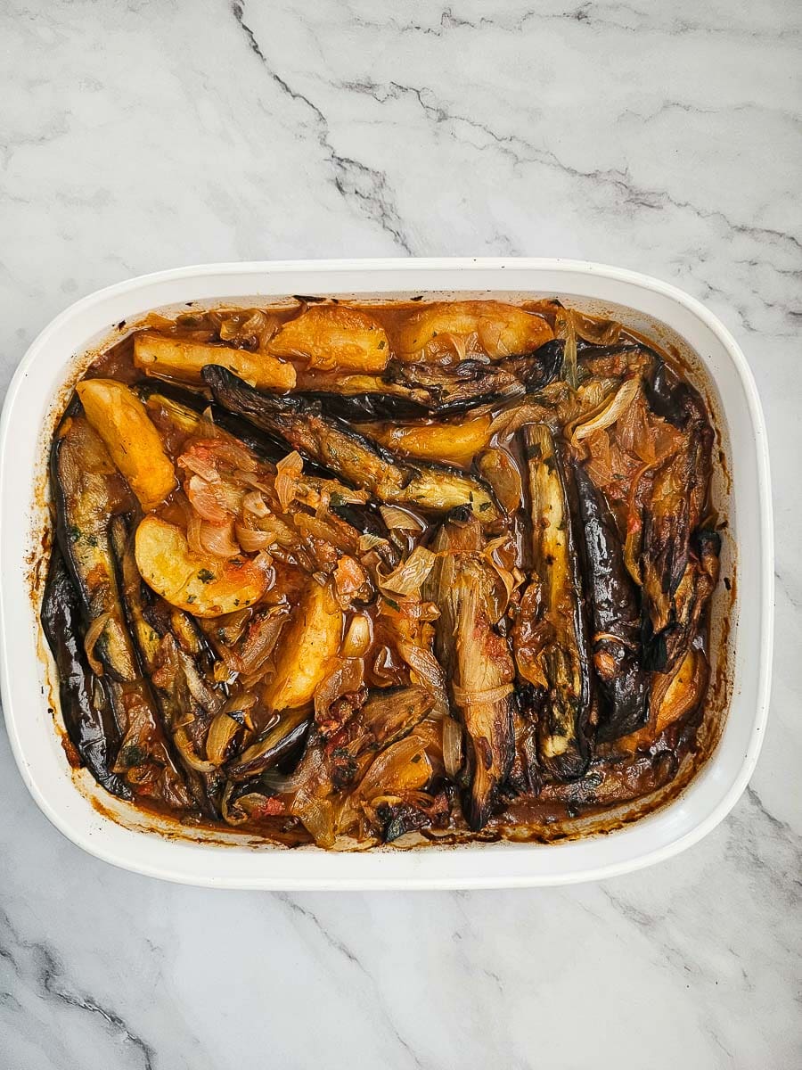 eggplant, potato and tomato casserole in baking dish