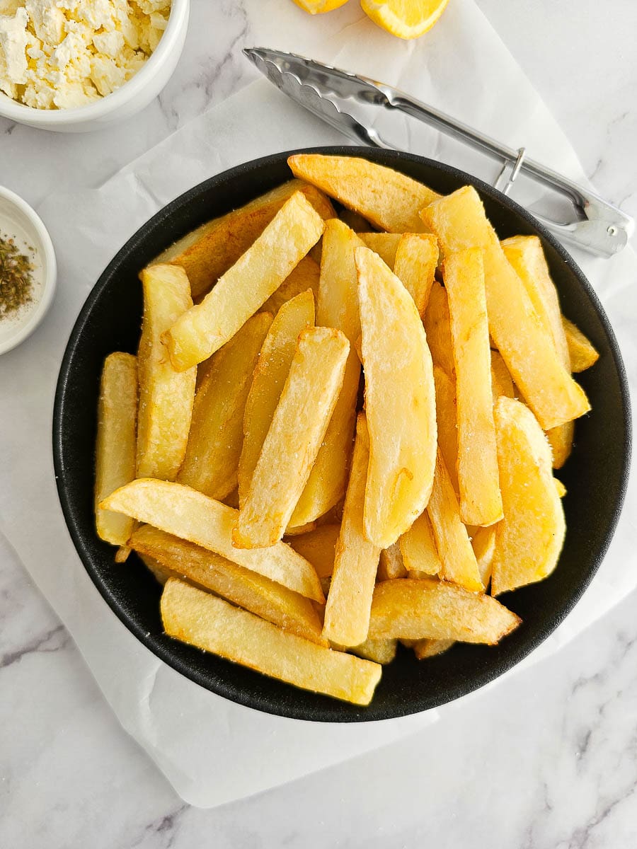 Greek Olive Oil Fries - Patates Tiganites in a bowl