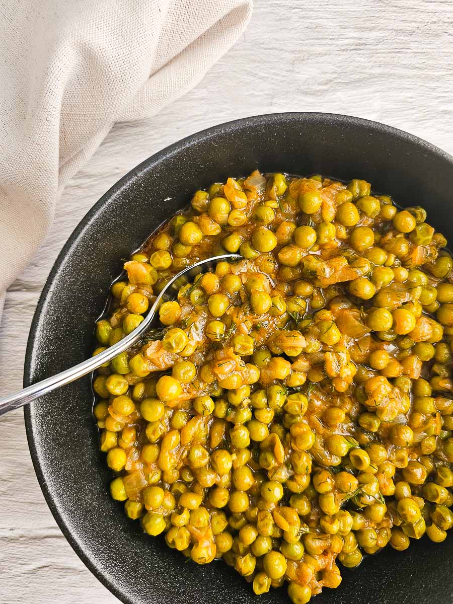 Greek Peas in Tomato Sauce (Arakas Latheros) in a bowl. 