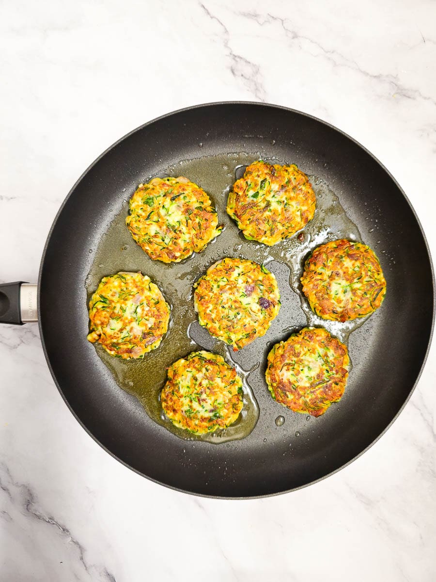 Greek zucchini fritters - kolokithokeftedes mixture in a bowl