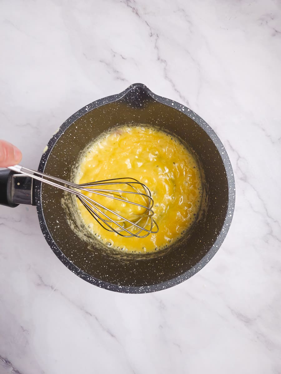 making lemon sauce in pot