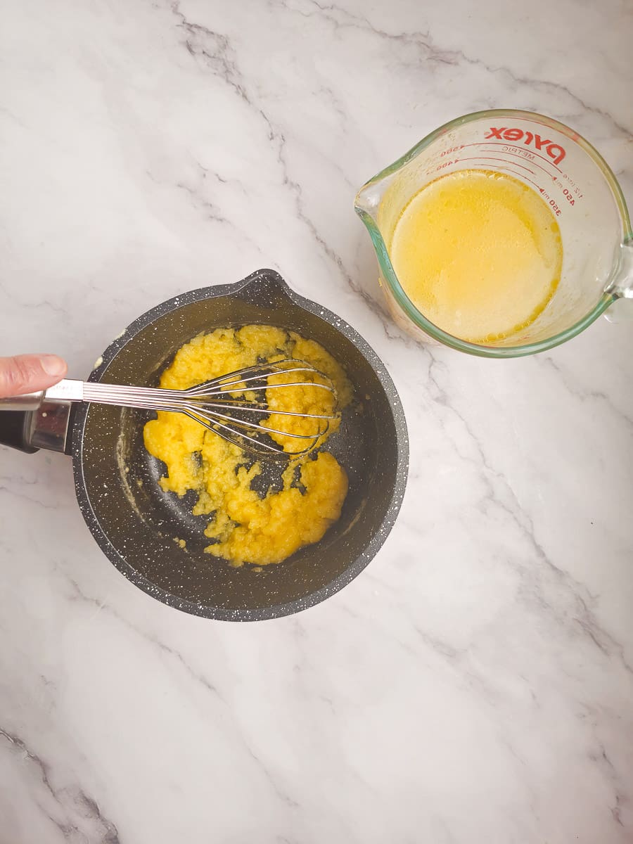 making lemon sauce in pot