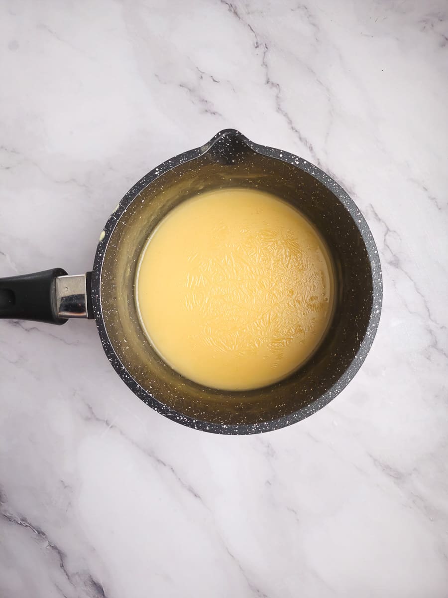 making lemon sauce in pot