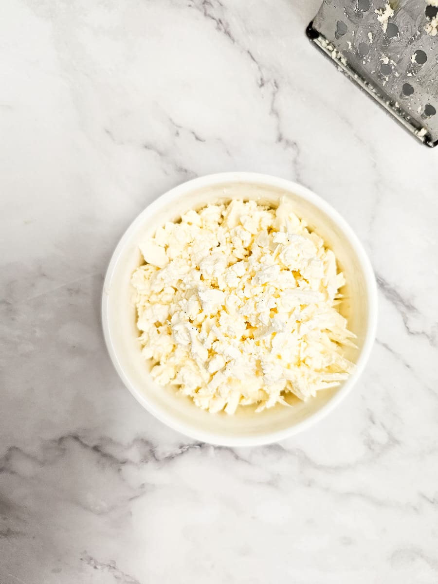 grated feta in bowl