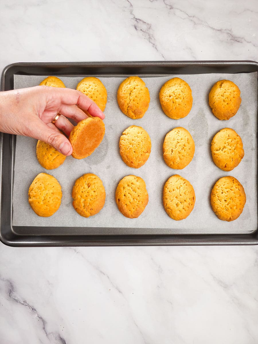 Melomakarona - Greek Honey Cookies on a baking ray after baking