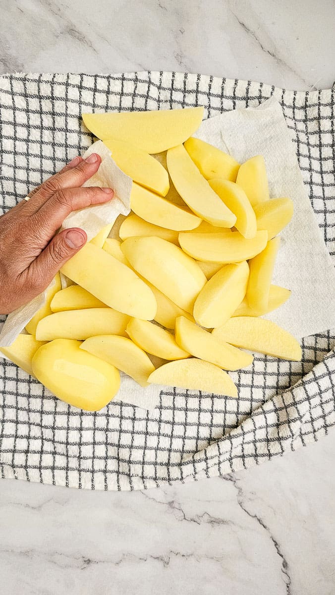 pat drying potato wedges