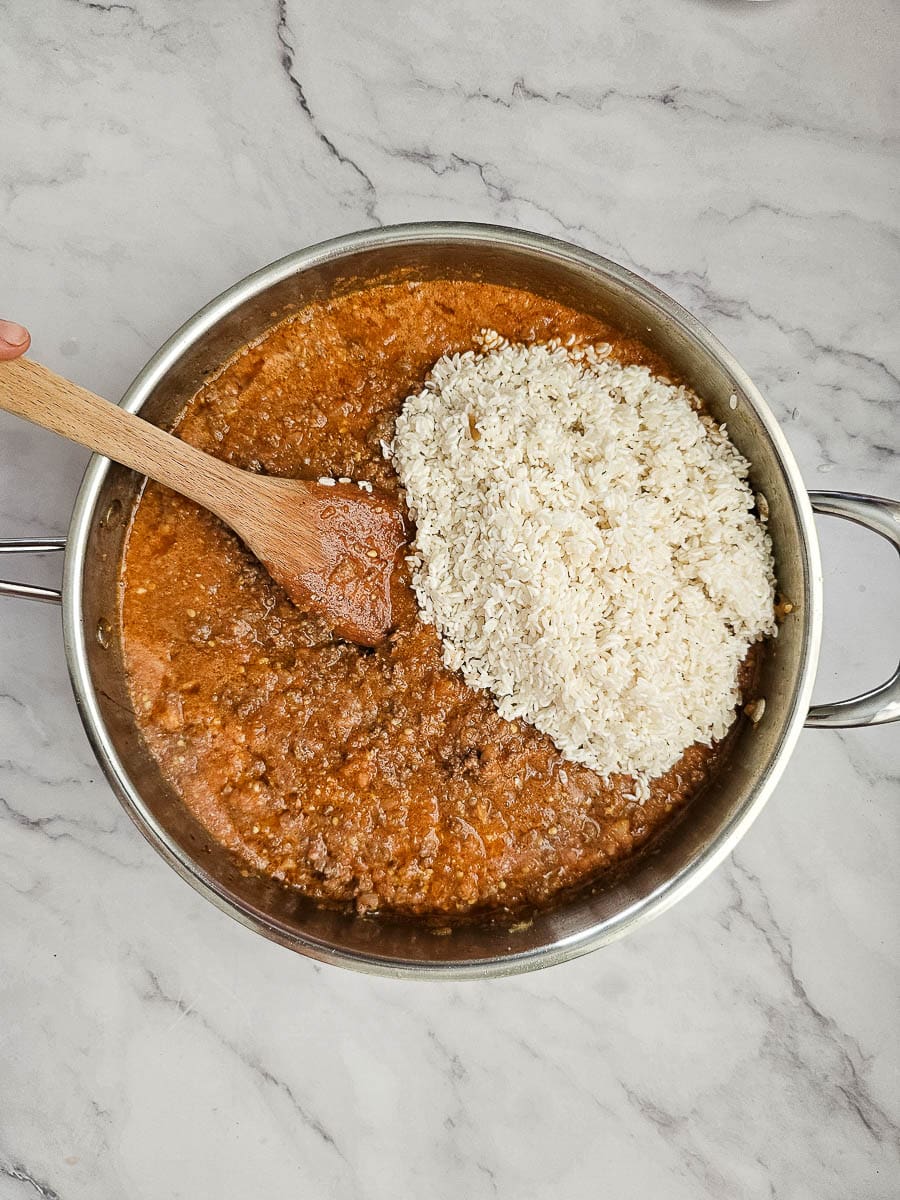 Greek Stuffed Tomatoes with Rice - adding rice to filling