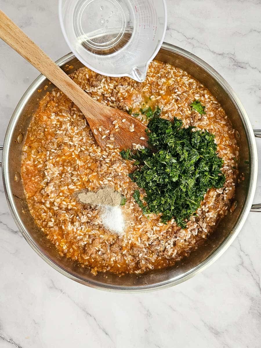 Greek Stuffed Tomatoes with Rice - adding parsley to filling