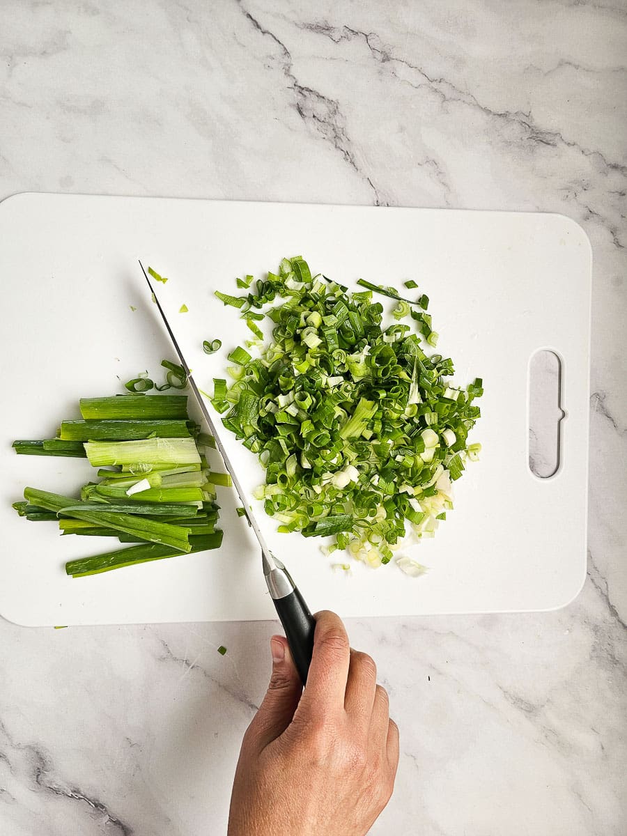 diced shallots on chopping board