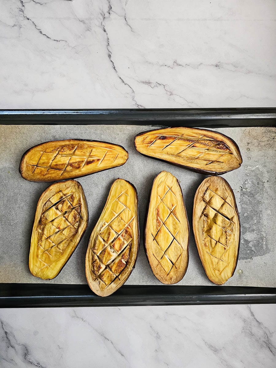 baking eggplant halbes on baking tray