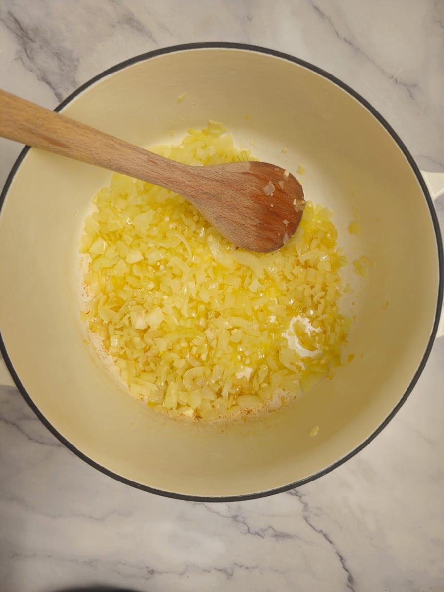simmering diced onions in dutch oven