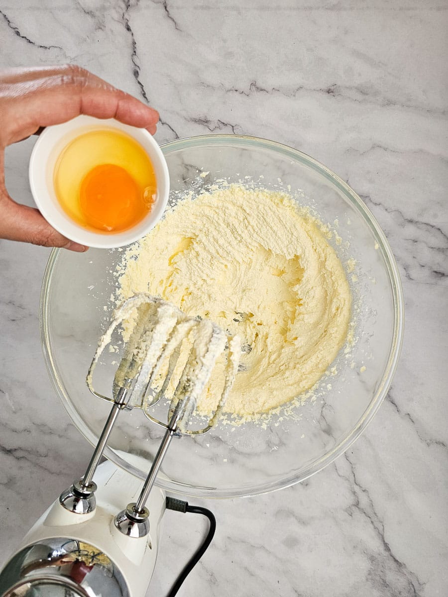 add egg to creamed butter and sugar